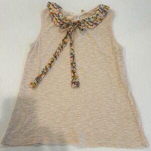 Very cute Love Dove flowered neckline; keyhole back sleeveless knit blouse